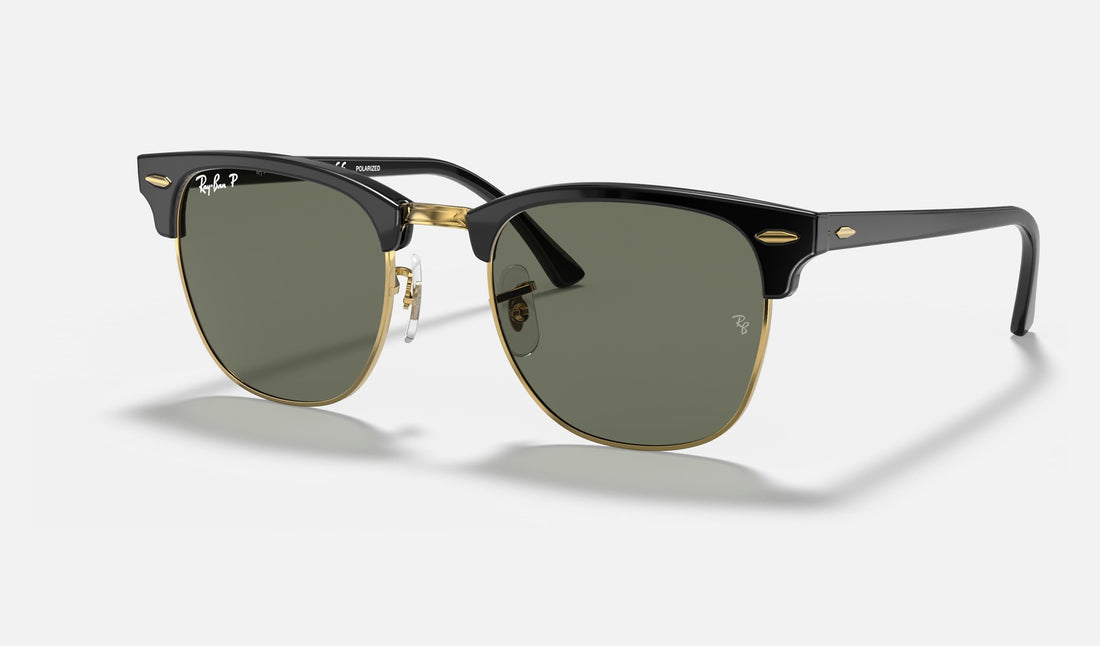 Ray-Ban Clubmaster RB3016 — Black & Gold / G-15 Green Polarized — quarter view
