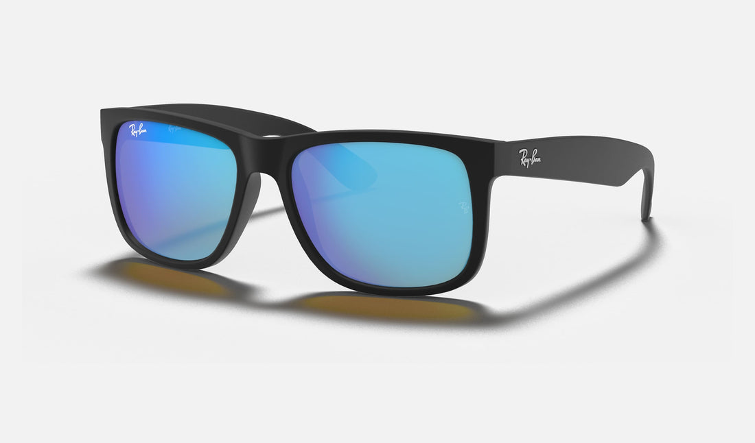 Ray-Ban Justin RB4165 — Rubber Black / Blue Mirror — quarter view