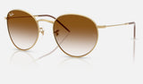 Ray-Ban Round Reverse RBR0103S — Arista Gold / Clear Gradient Brown — quarter view