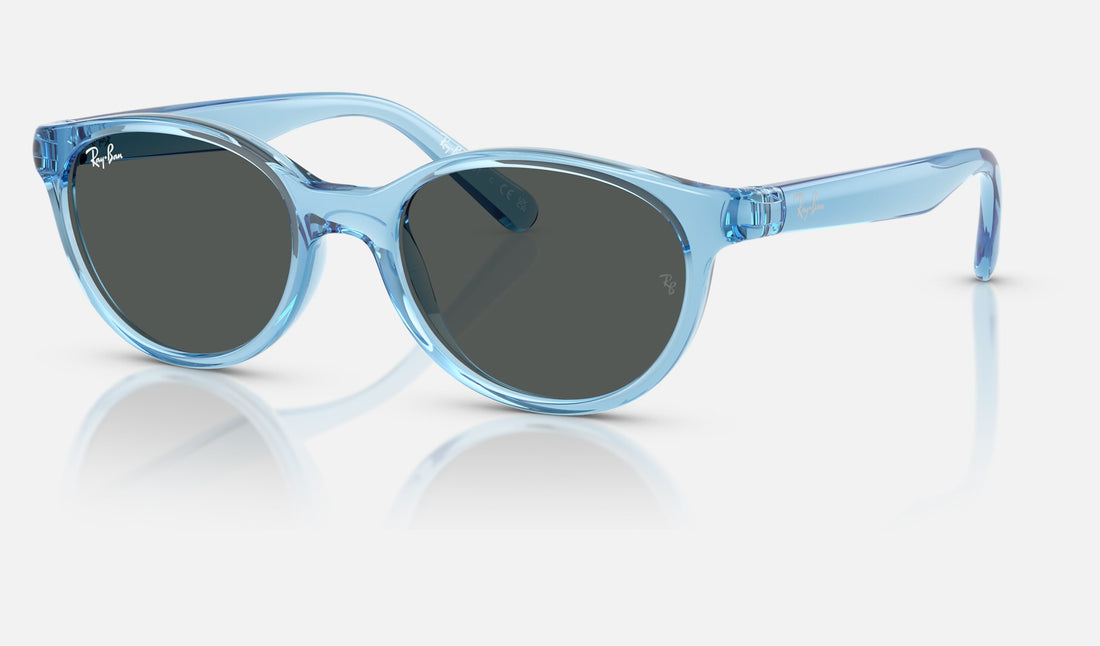 Ray-Ban Junior RJ9080S — Transparent Blue / Dark Grey — quarter view