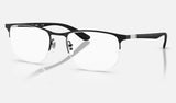 Ray-Ban RX6513 — Matte Black on Black — quarter view
