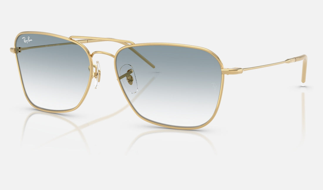 Ray-Ban Caravan Reverse RBR0102S — Arista Gold / Clear Gradient Blue — quarter view