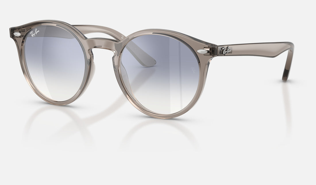 Ray-Ban Junior RJ9064S — Transparent Grey / Clear Gradient Blue Mirror Silver — quarter view