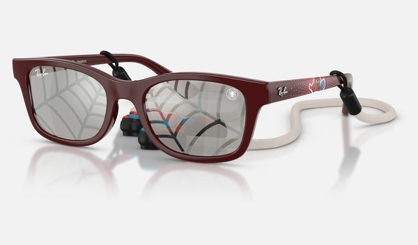 Ray-Ban Junior RJ9086S — Dark Red / Grey Tampo Triangles Silver — quarter view