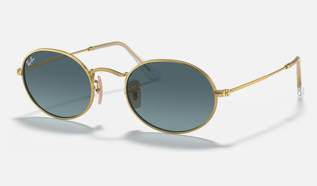 Ray-Ban Oval RB3547 — Arista Gold / Blue Gradient — quarter view