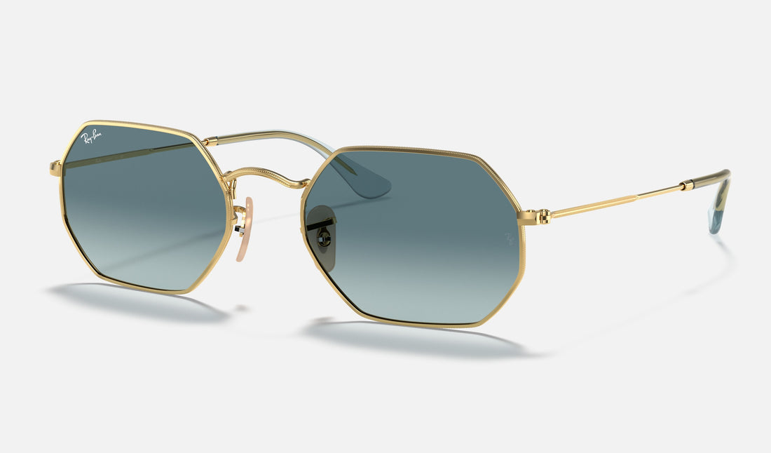 Ray-Ban Octagonal RB3556N — Arista Gold / Blue Gradient — quarter view