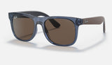 Ray-Ban Junior Junior Justin RJ9069S — Transparent Blue / Dark Brown — quarter view