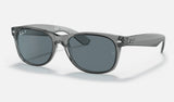 Ray-Ban New Wayfarer RB2132 — Transparent Grey / Dark Blue Polarized — quarter view