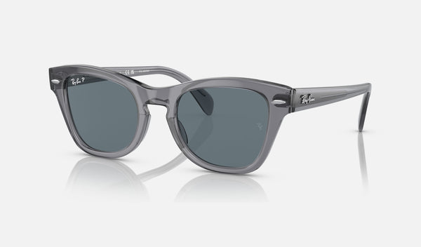 Ray-Ban RB0707S — Transparent Grey / Dark Blue Polarized — quarter view